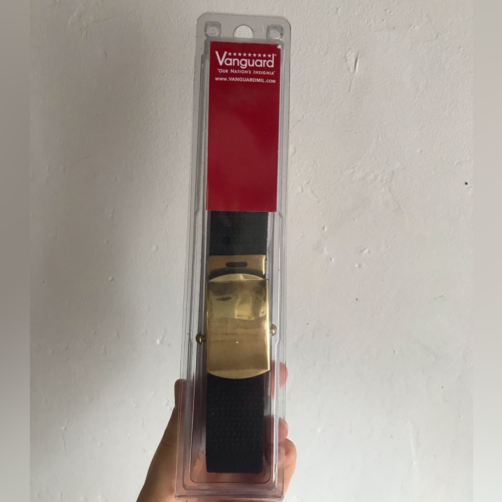 Black belt with gold metal buckle